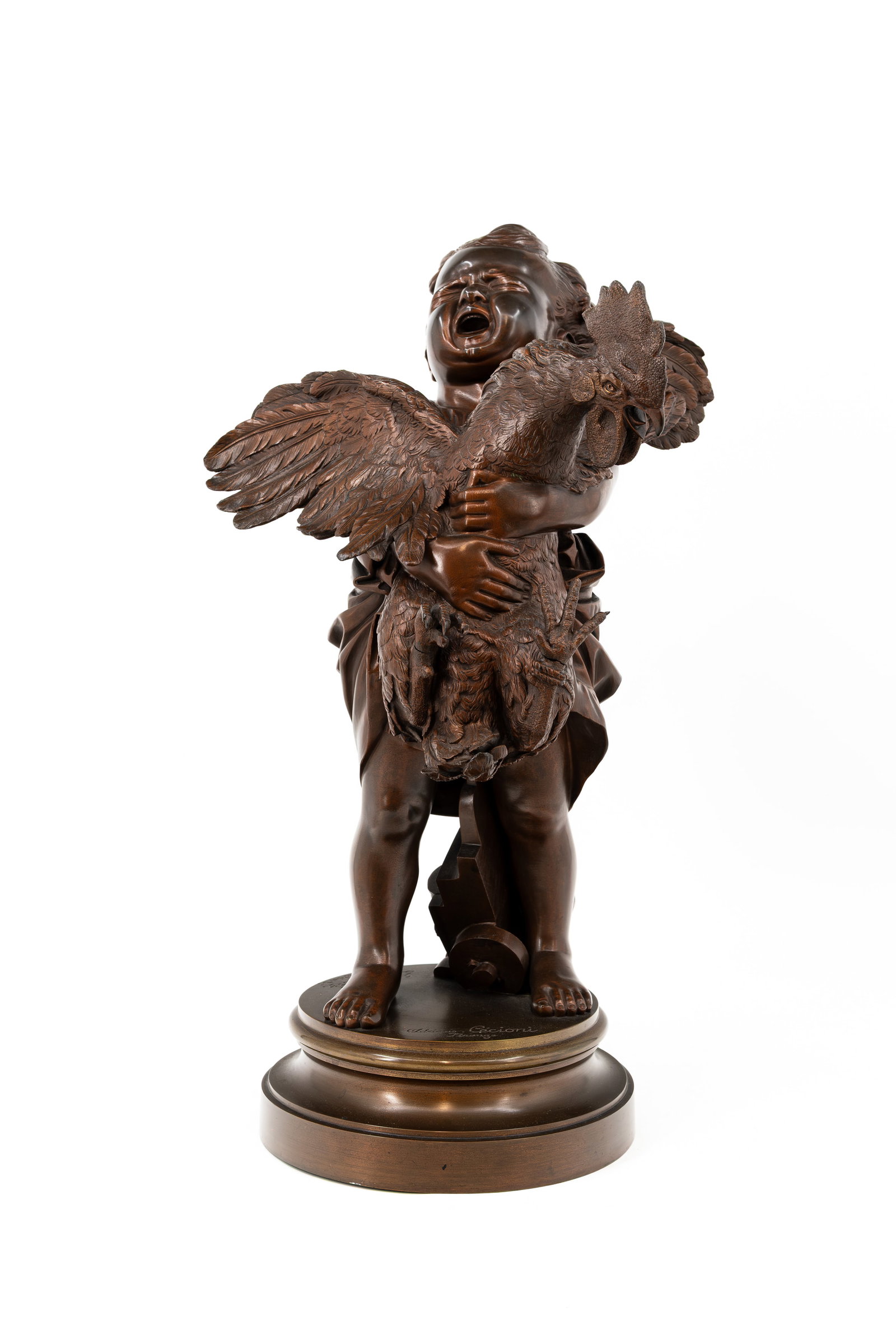 Adriano CECIONI (1836-1886) "'Enfant au coq''. An antique patinated bronze sculpture: Adriano CECIONI (1836-1886) "'Enfant au coq''. An antique patinated bronze sculpture of a young boy holding a rooster. Foundry Louis Martin. Signed by the artist and the foundry. H: 52 cm.