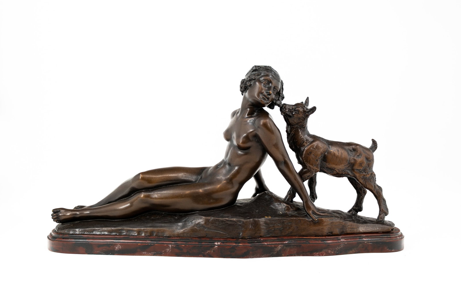 Pierre-Alexandre MORLON (1878-1951) "Jeune Fille au Cabri". An Art Deco patinated bronze sculpture: Pierre-Alexandre MORLON (1878-1951) "Jeune Fille au Cabri". An Art Deco patinated bronze sculpture of a nude lady with a young goat. Mounted on a matching marble base. Signed, circa 1900-1920s. H: 33,
