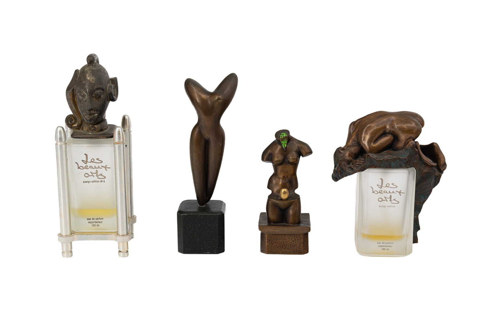 A collection of four various bronze art sculpture perfume bottle caps: A collection of four various bronze art sculpture perfume bottle caps, after Salvador DALI - Space Venus, after Paul WUNDERLICH 118/14.999, after Marco PIONO - La Danse 2735/5000, after Auguste RODIN 