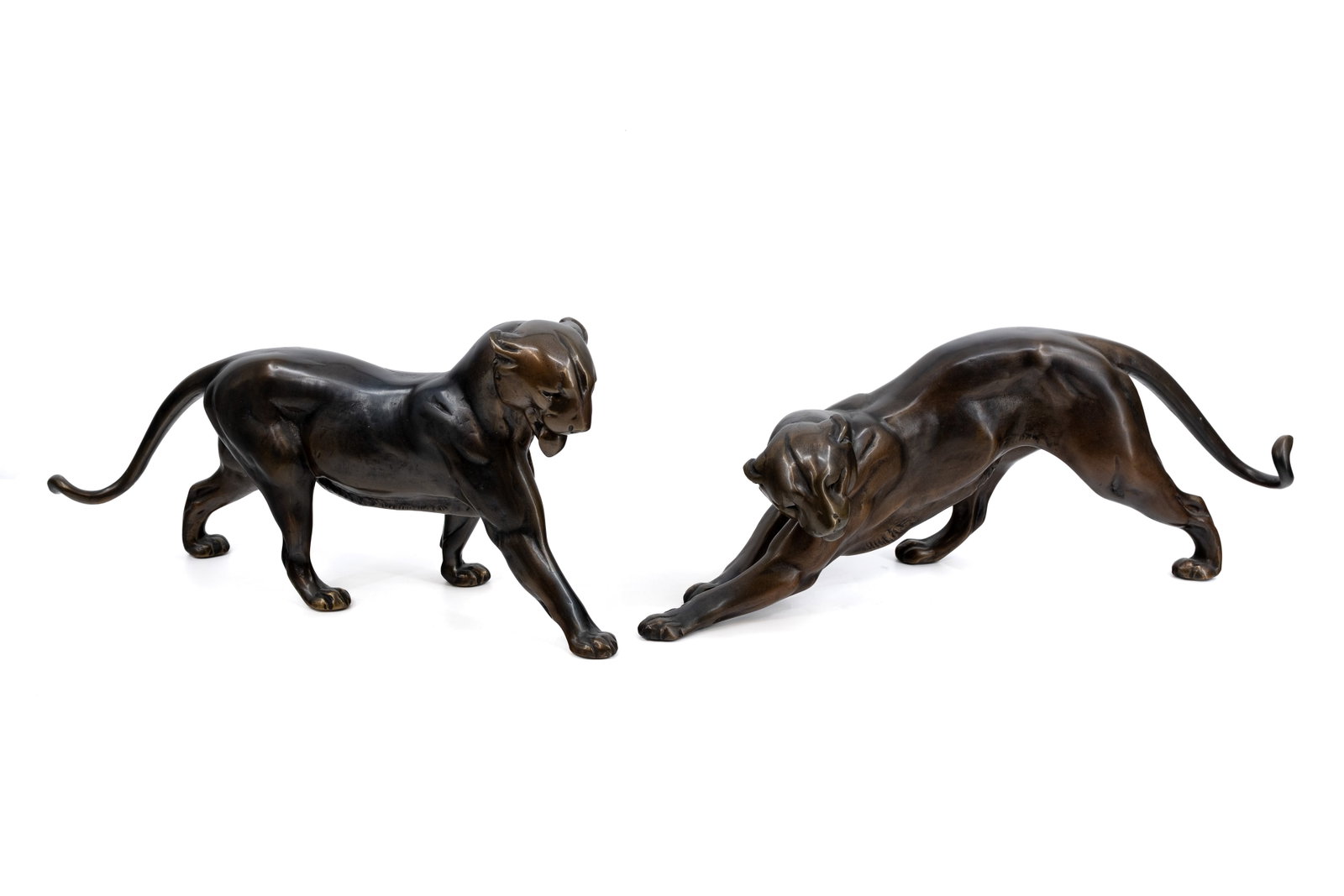 A lot of two large art deco style animalier patinated spelter sculptures of standing panthers (1 of 11)