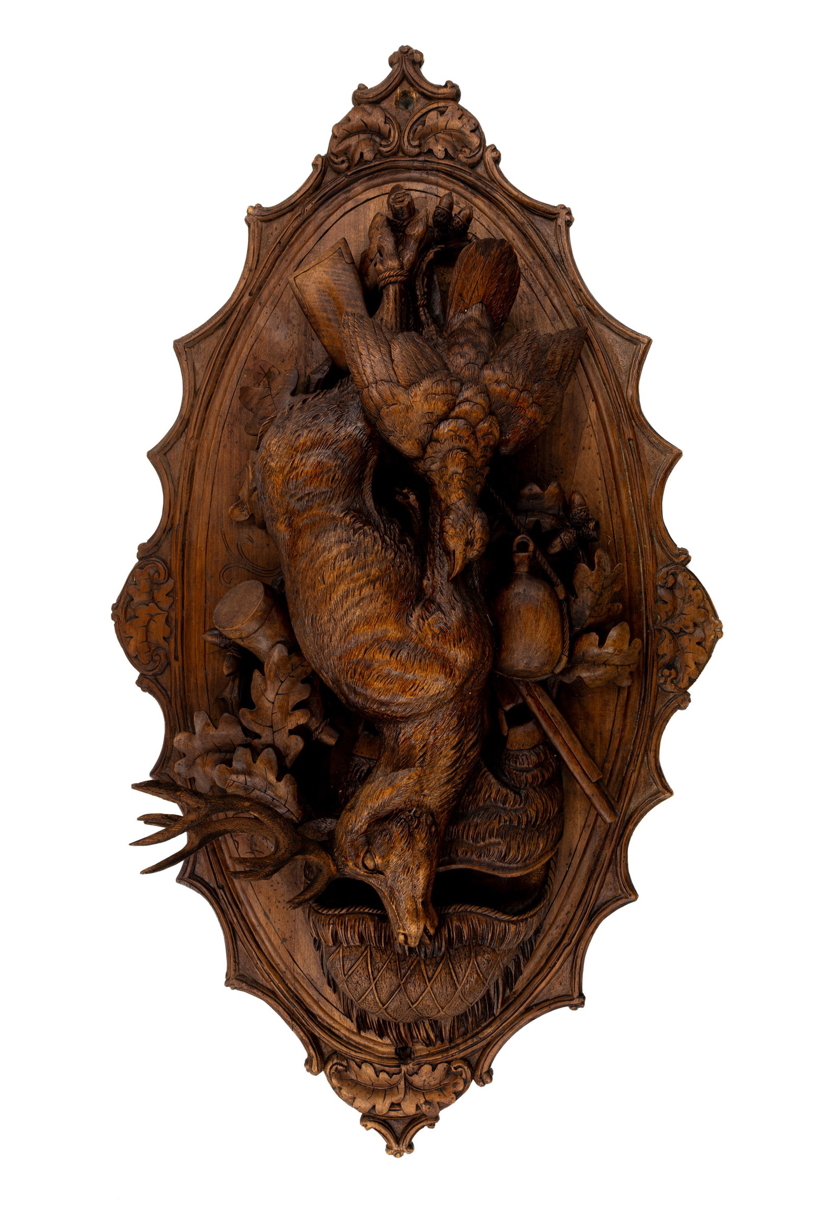 A large and antique German Black forest carved wooden wall plaque displaying hunting trophies (1 of 3)