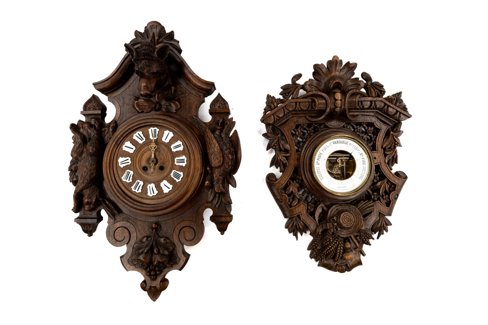 A composed lot of an antique German Black Forest carved wooden wall clock and a barometer (1 of 13)