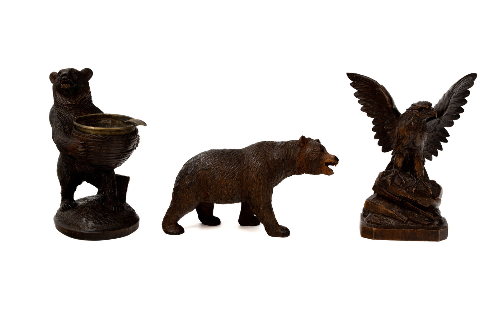 A composed lot of three various antique German Black Forest carved wooden figures (1 of 11)