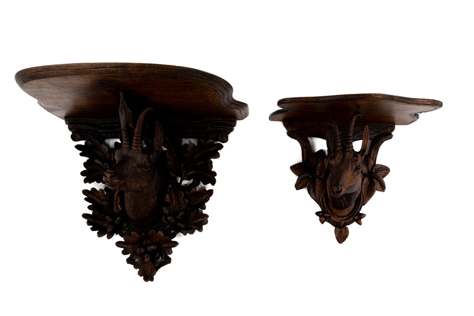 A composed lot of two antique German Black forest carved wooden wall consoles (1 of 8)