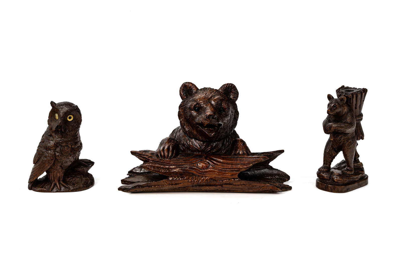 A composed lot of three small and antique German Black Forest carved wooden sculptures (1 of 20)