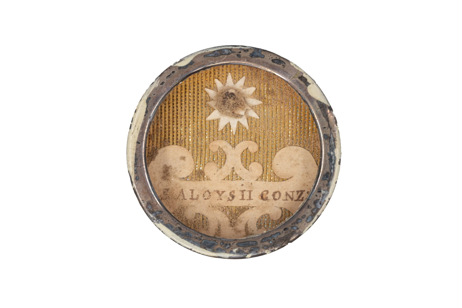 A sealed theca containing a relic from the shoulder of Saint Aloysius Gonzaga, with a COA: A sealed theca containing a relic from the shoulder of Saint Aloysius Gonzaga, with an Engelbertus Certificate of Authenticity. "S. Aloysii Gonz." 1838 W: 3,6 cm The theca and any accompanying documen