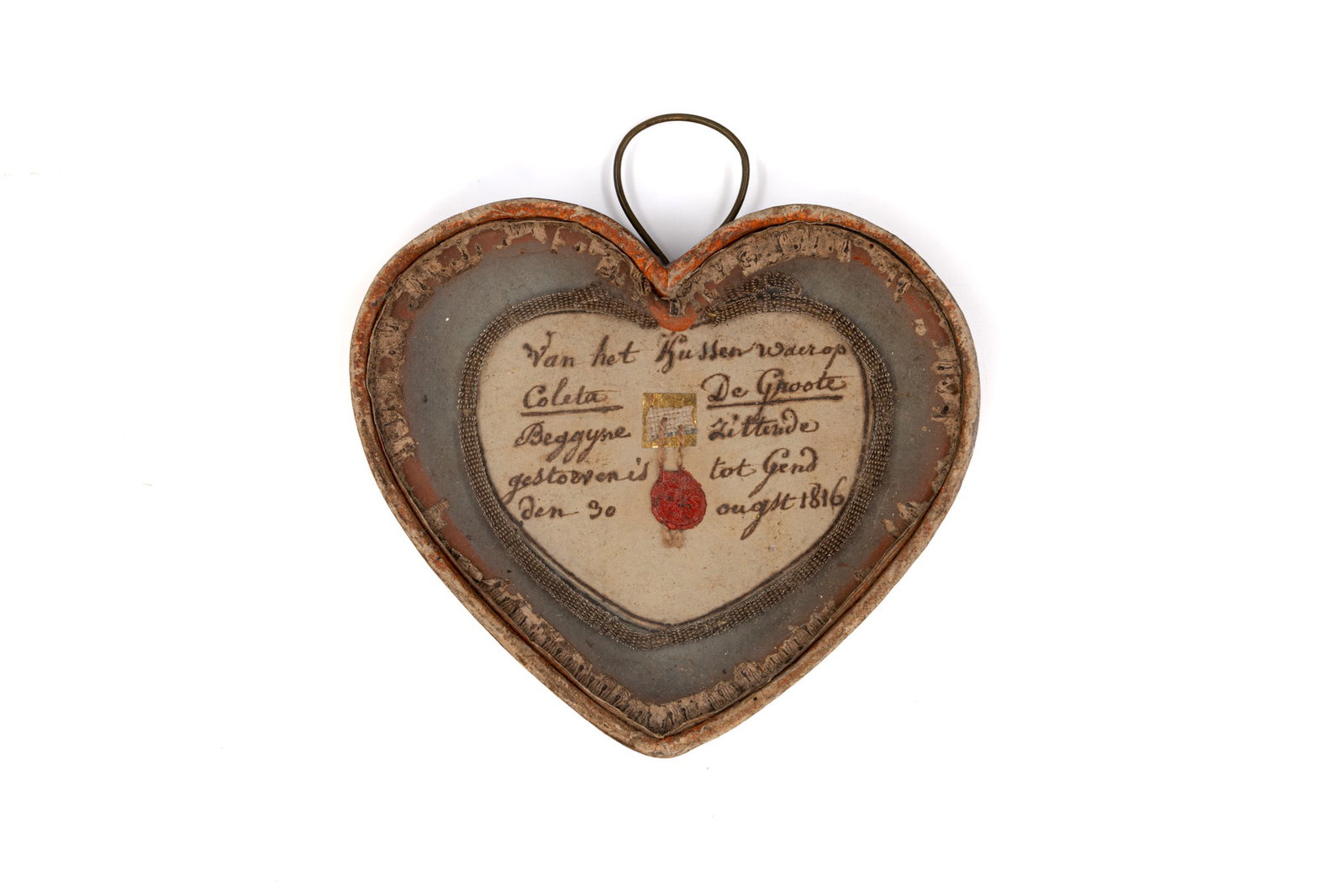 A heart-shaped reliquary containing a textile relic associated with Coleta De Groote (1 of 2)