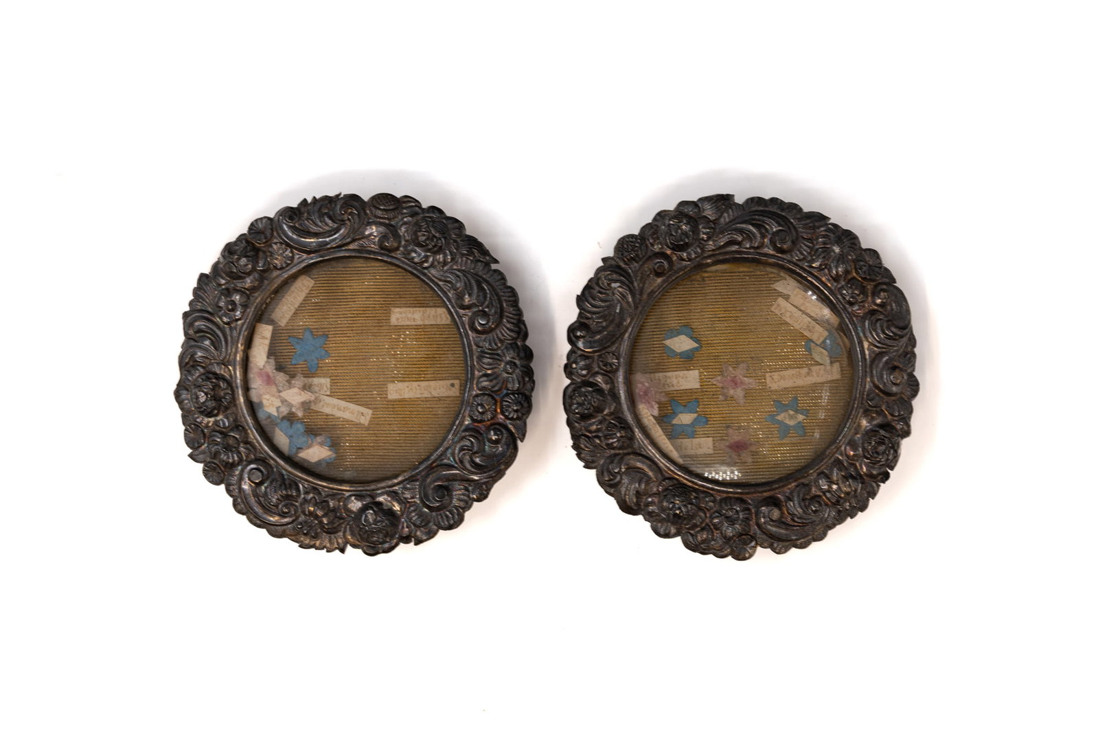 A pair of richly decorated circular multithecas containing relics of various Saints (1 of 7)