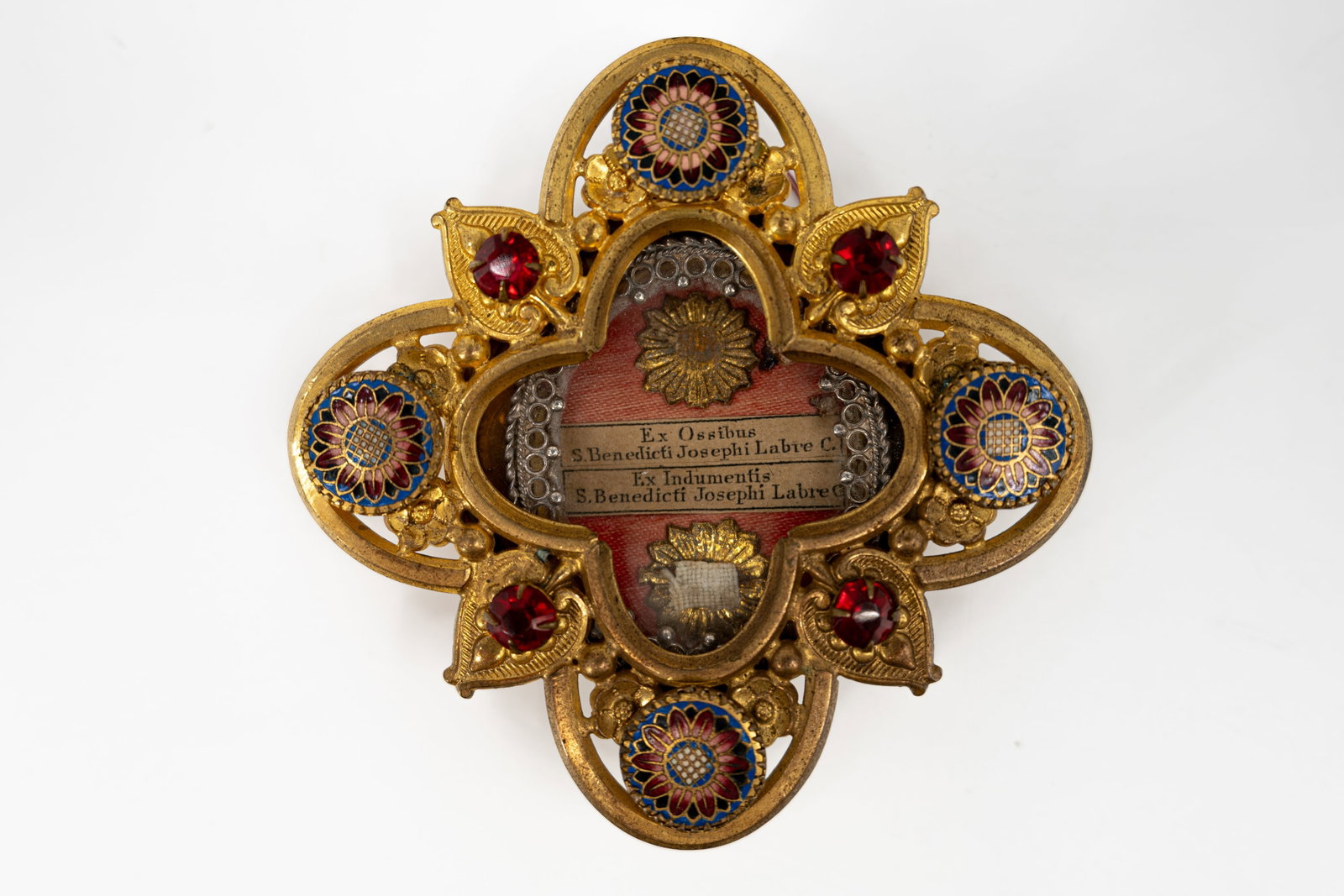 A richly decorated sealed multitheca containing two relics of Saint Benedict Joseph Labre (1 of 5)