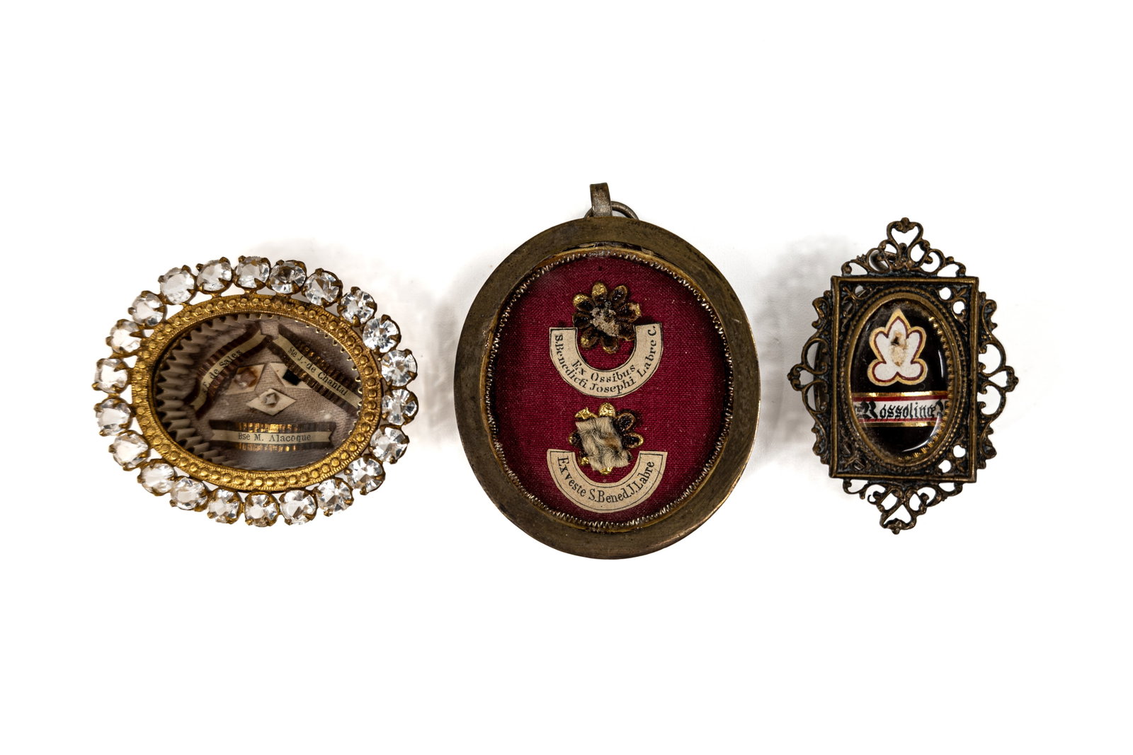 A composed lot of three antique sealed thecas, containing various relics (1 of 10)