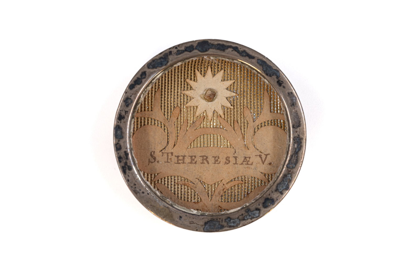 A sealed theca containing a relic of Saint Teresa, Virgin, with a Certificate of Authenticity (1 of 3)