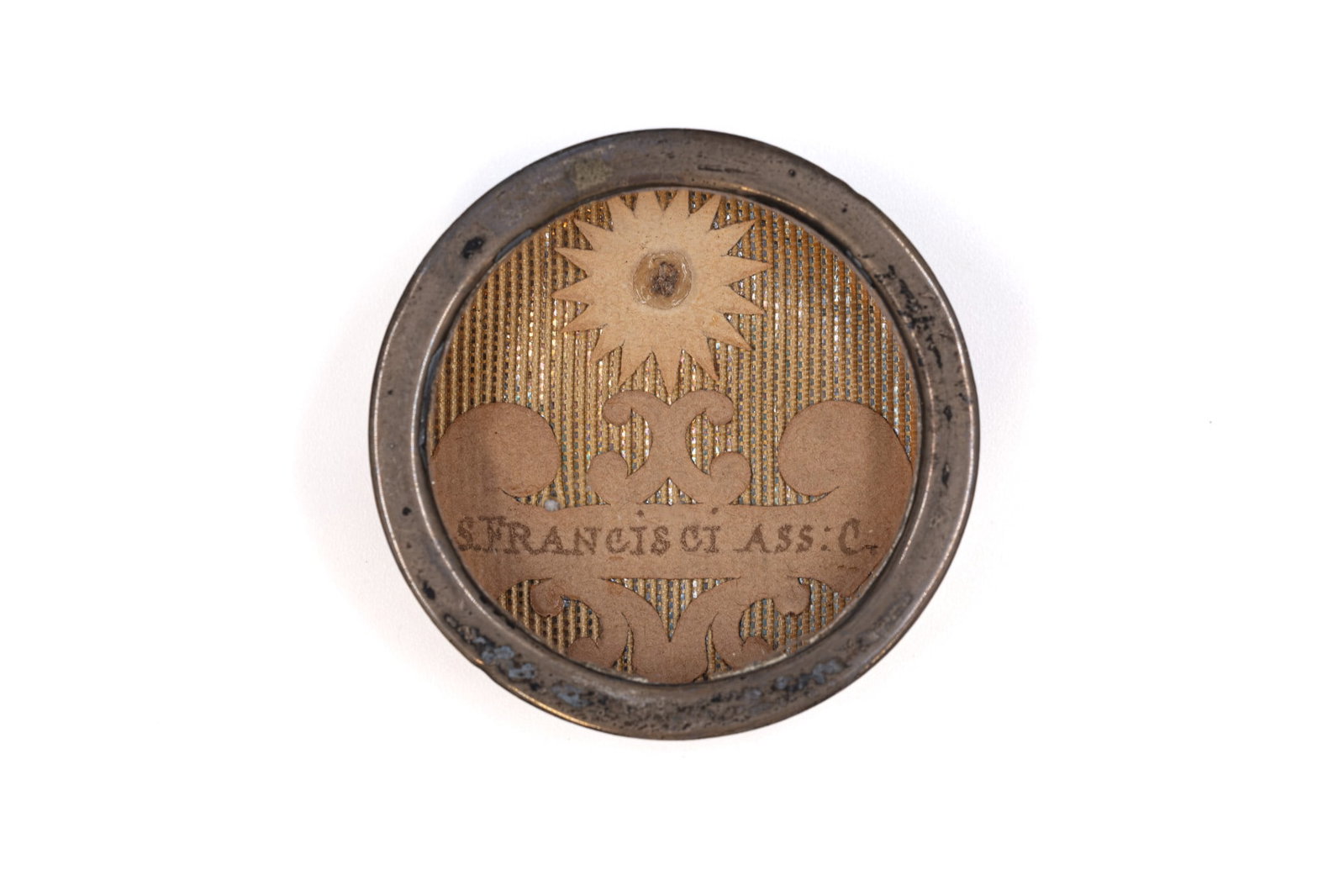 A sealed theca containing a relic of Saint Francis of Assisi, with a Certificate of Authenticity (1 of 3)