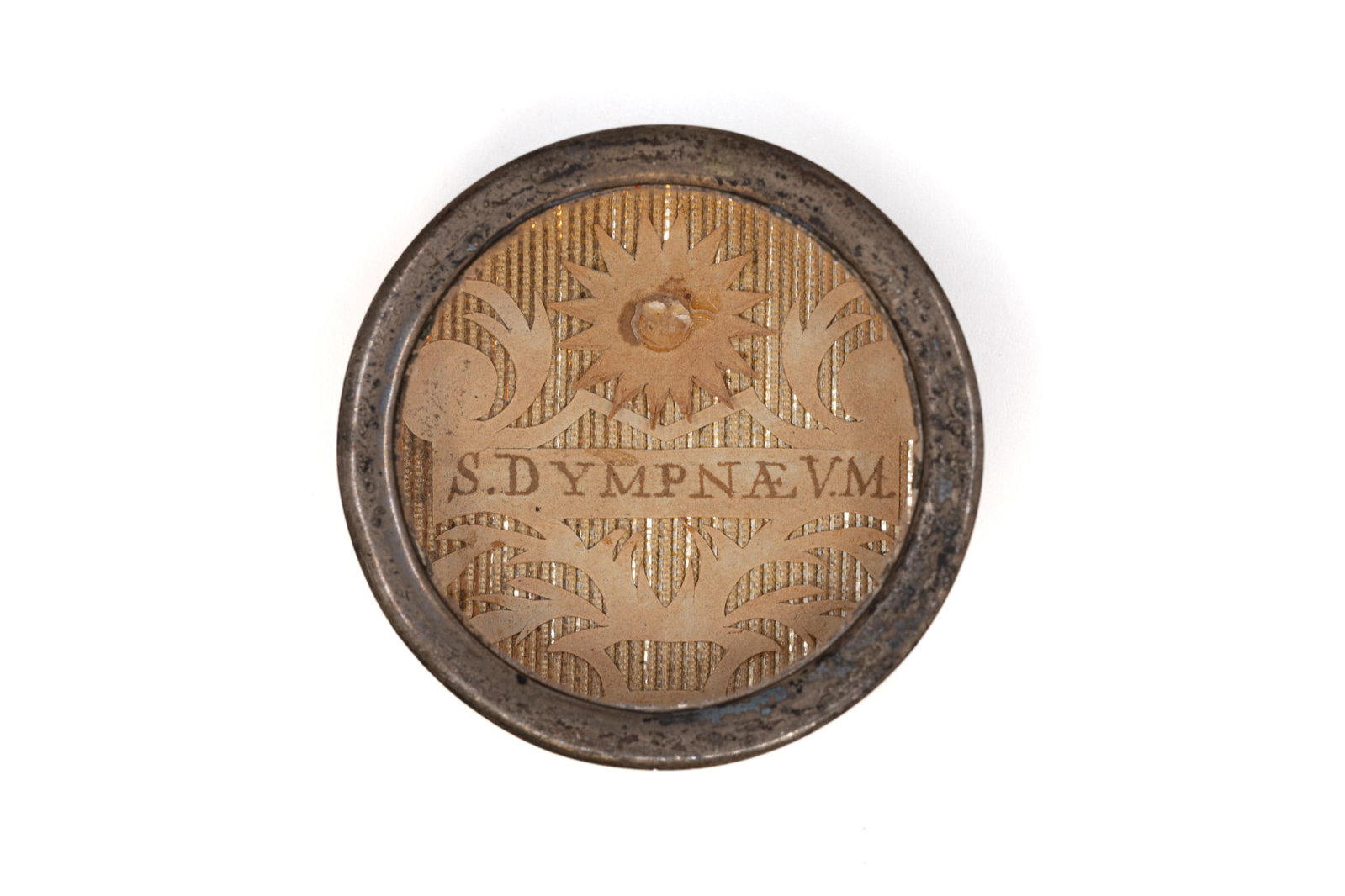A sealed theca containing a relic of Saint Dymphna, with a Certificate of Authenticity: A sealed theca containing a relic of Saint Dymphna, Virgin and Martyr, with an Engelbertus Certificate of Authenticity. "S. Dympnae. V.M." 1842 W: 3,7 cm The theca and any accompanying documentation a