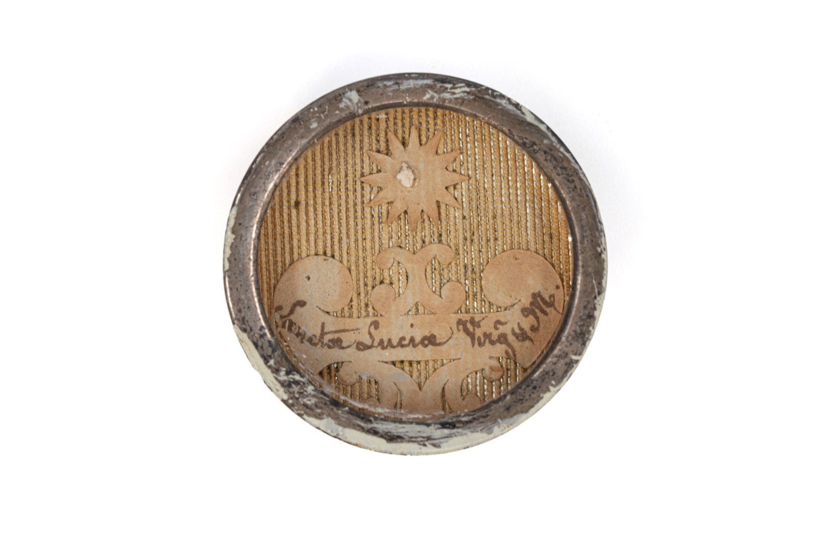 A sealed theca containing a relic of Saint Lucy, with a Certificate of Authenticity: A sealed theca containing a relic of Saint Lucy, Virgin and Martyr, with an Engelbertus Certificate of Authenticity. "Sancta Lucia Virg. & M." 1843 W: 3,7 cm The theca and any accompanying documentati
