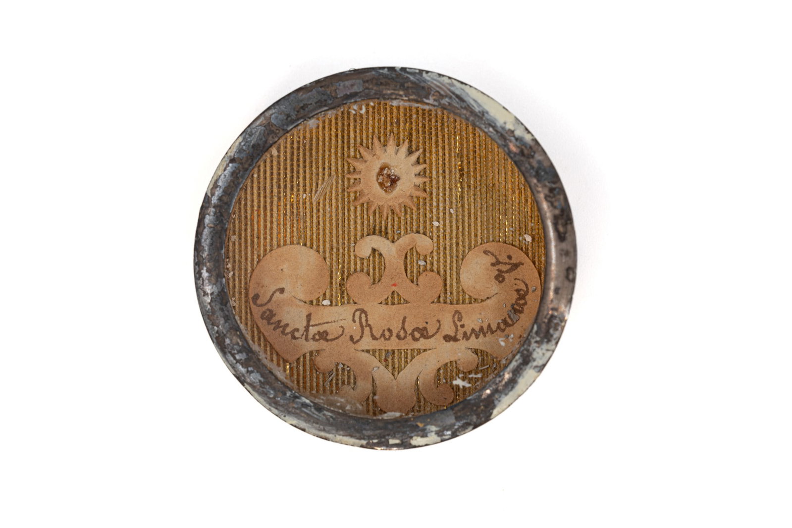 A sealed theca containing a relic of Saint Rose of Lima, with a Certificate of Authenticity: A sealed theca containing a relic of Saint Rose of Lima, Virgin, with an Engelbertus Certificate of Authenticity. "Sancta Rosa Limanae V." 1843 W: 3,7 cm The theca and any accompanying documentation a