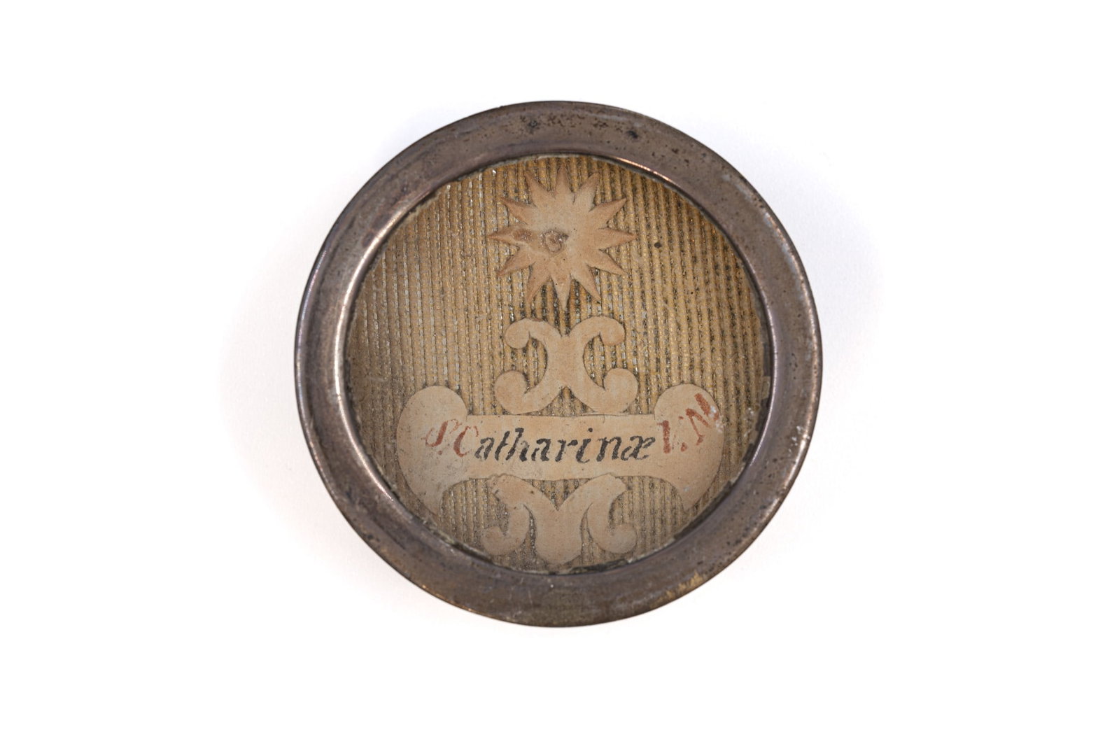 A sealed theca containing a relic of Saint Catherine, with a Certificate of Authenticity (1 of 3)