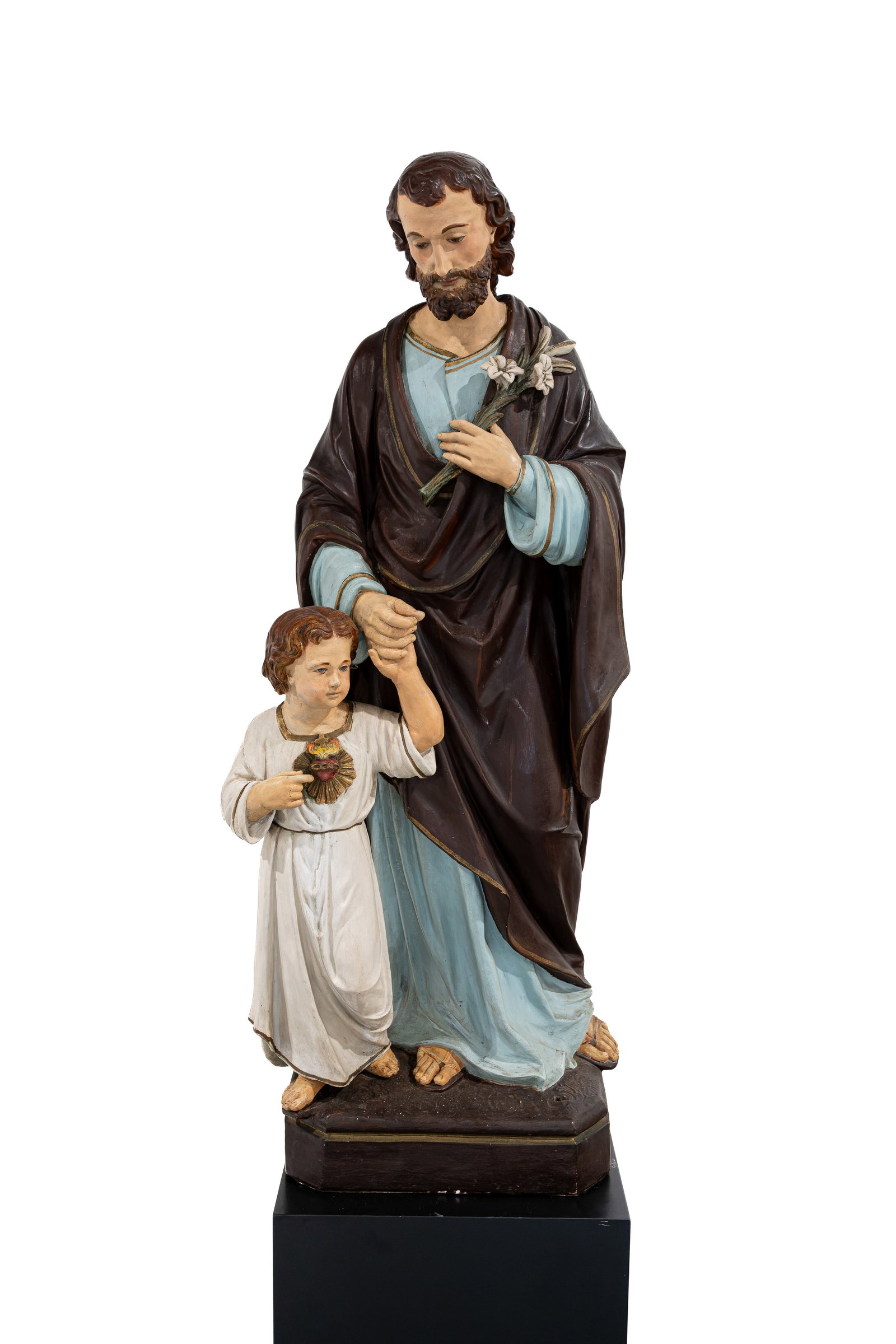 A large religious figural patinated terra cotta figure of Saint Joseph with Child (1 of 9)