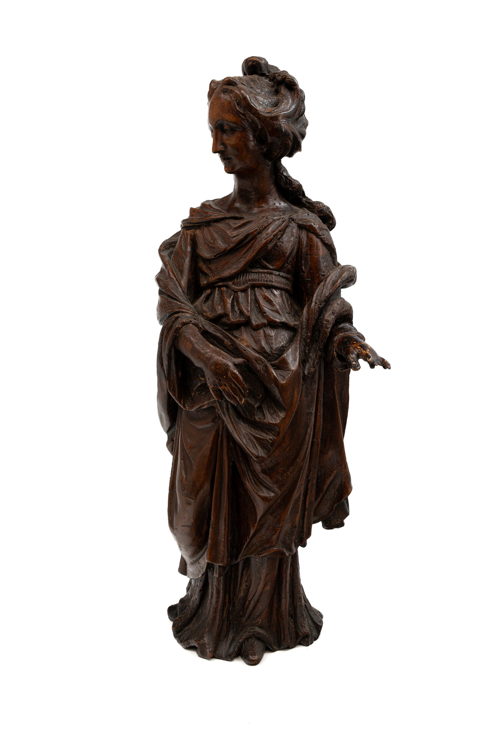 An antique Baroque figural carved oak sculpture: An antique Baroque figural carved oak sculpture representing of a standing lady. 18th/19th century. Condition: damage to the fingers, report available on request. H: 69 cm