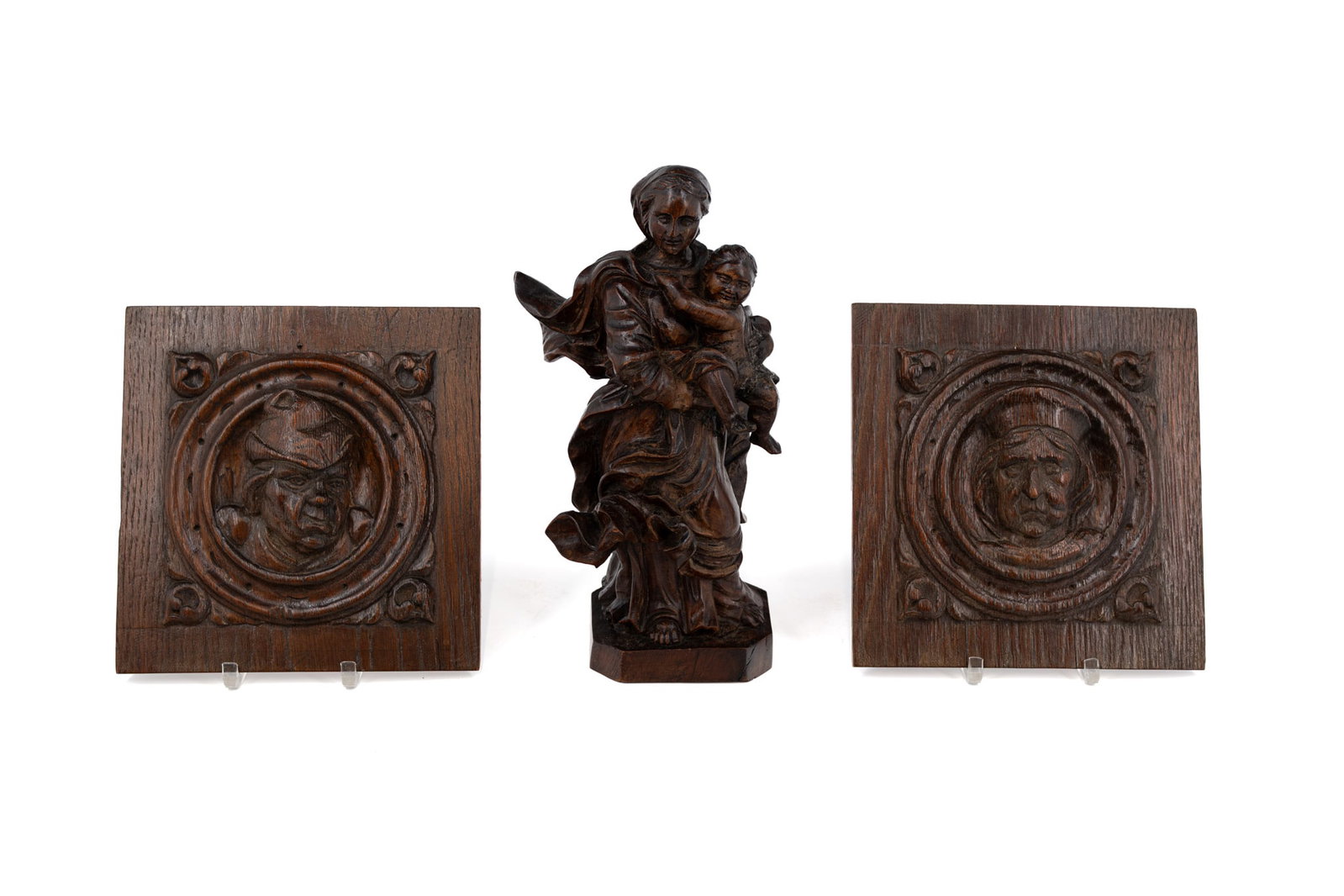 A composed lot of three antique carved oak wood figural and bas relief sculptures (1 of 13)
