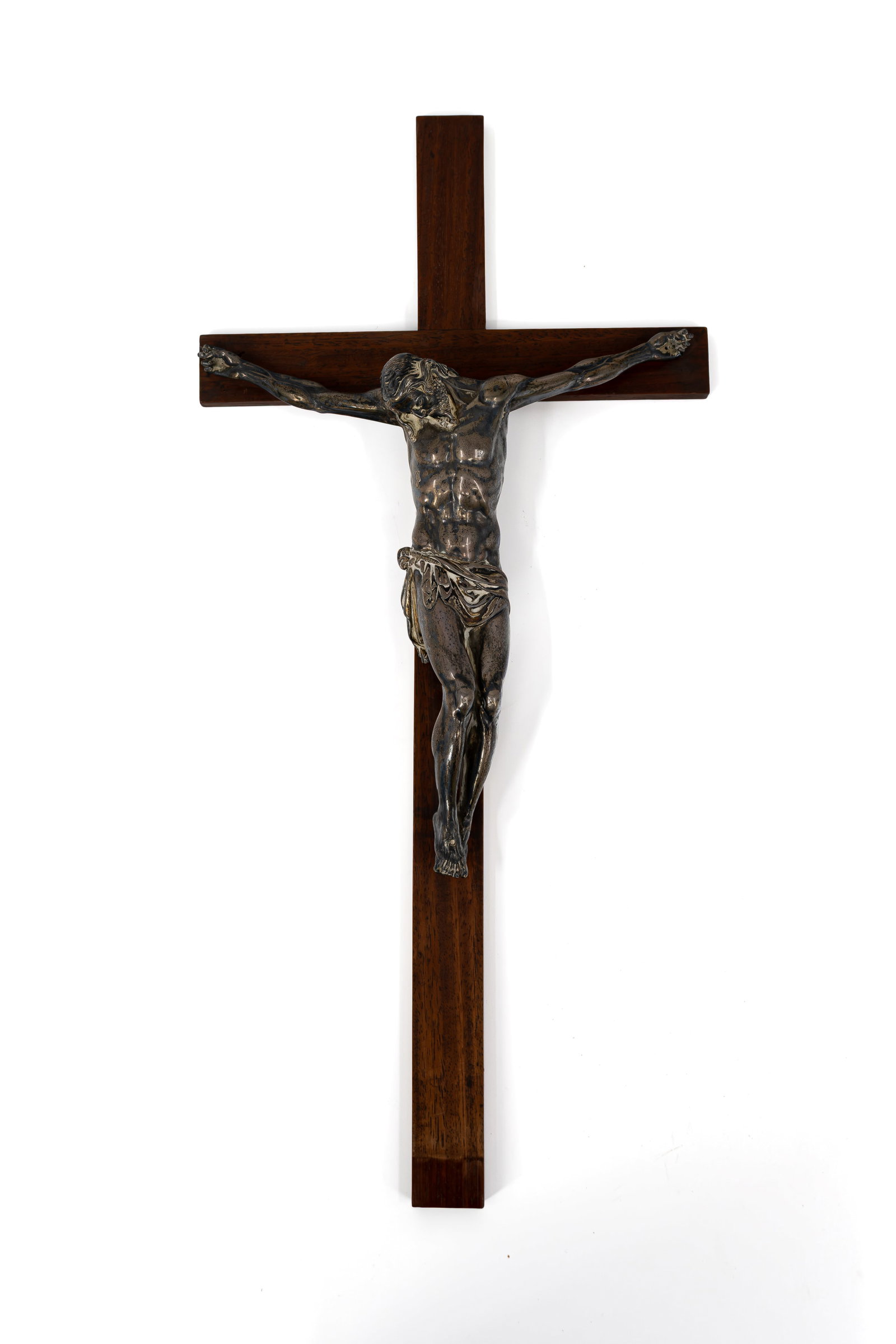 A large and antique figural silver corpus of Christ on wooden cross: A large and antique figural silver corpus of Christ on wooden cross. No hallmarks, only the silver testing mark has been found at the back. 18th century. H: 25 cm, corpus