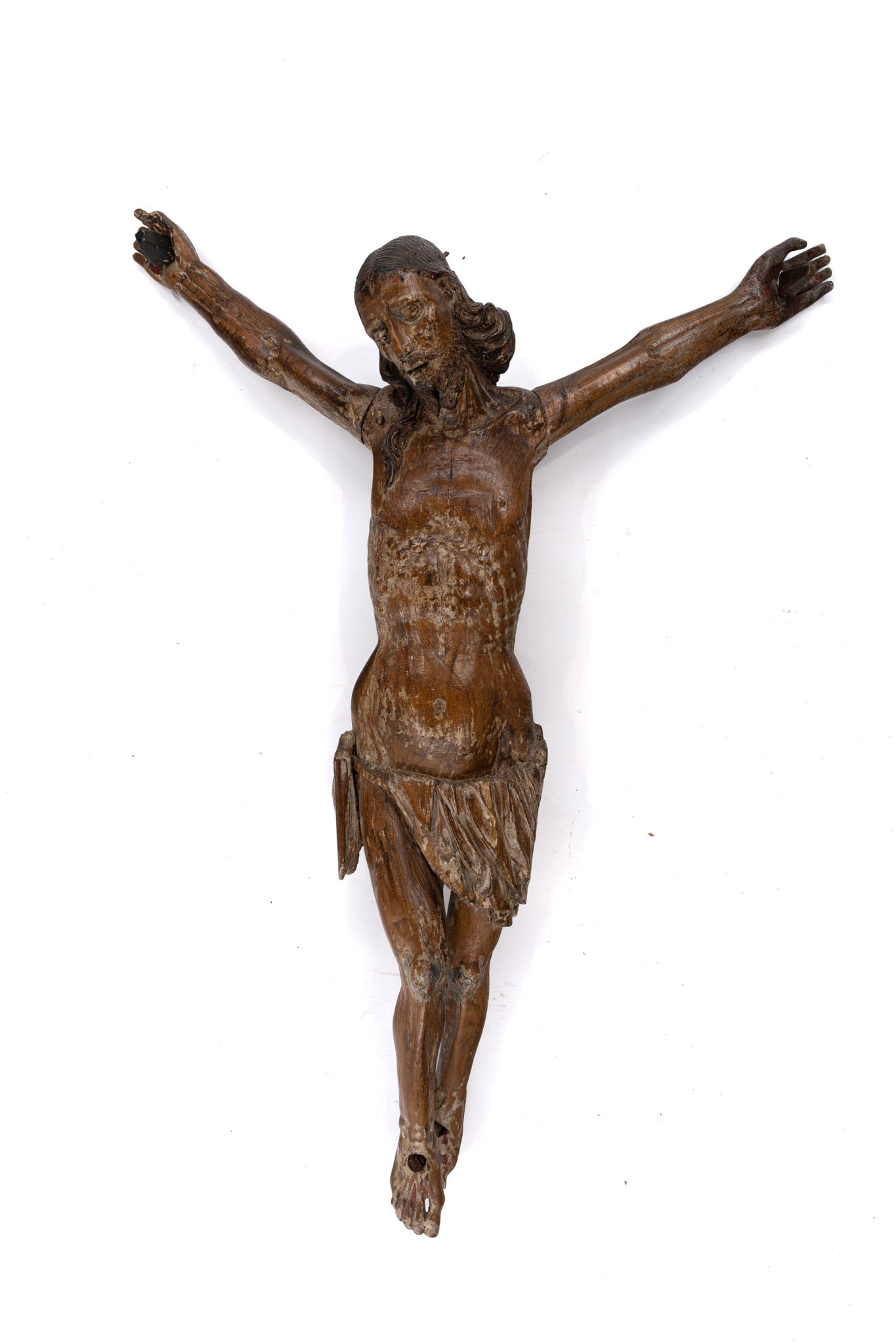 A large and antique carved wood partly patinated corpus sculpture: A large and antique carved wood partly patinated corpus sculpture of Christ with rests of polychromy. 18th century. H: 90 - W: 63 cm