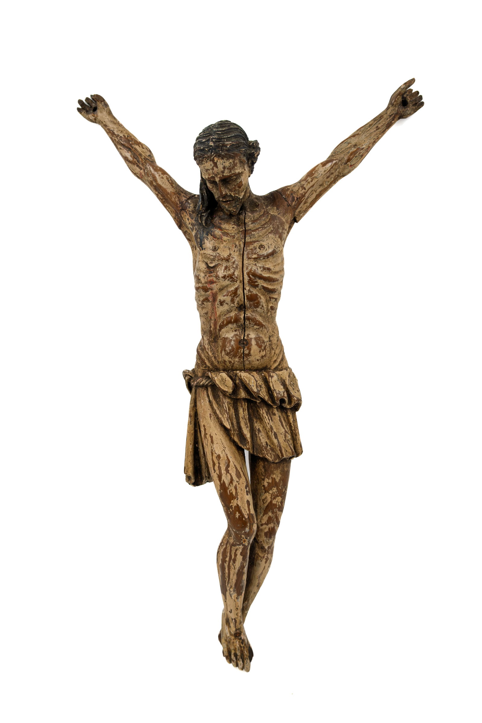 A large and antique polychrome patinated carved wood corpus sculpture of Christ (1 of 3)