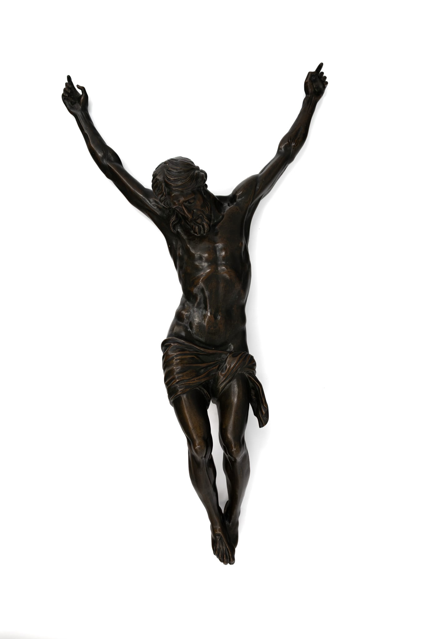 A large and antique religious patinated bronze Crucifix sculpture: A large and antique religious patinated bronze Crucifix sculpture of Christ. Backside with old label: ecclesiastical art exhibition - 1959. Circa 1900. H: 80 cm