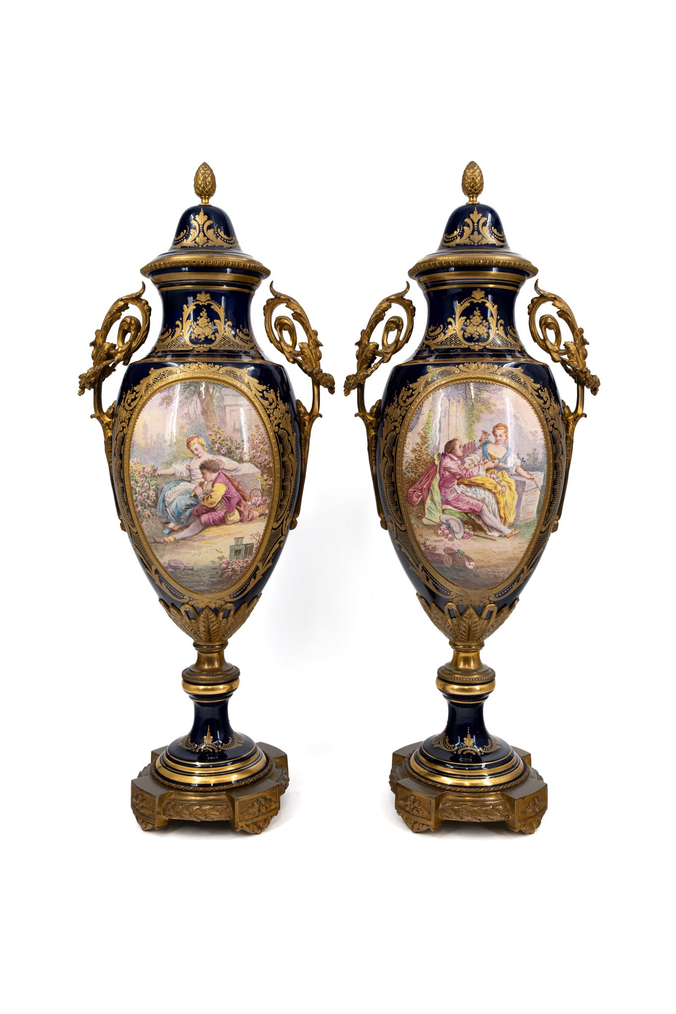 A pair of large French Sevres style cobalt blue and with a romance scene decorated porcelain (1 of 19)