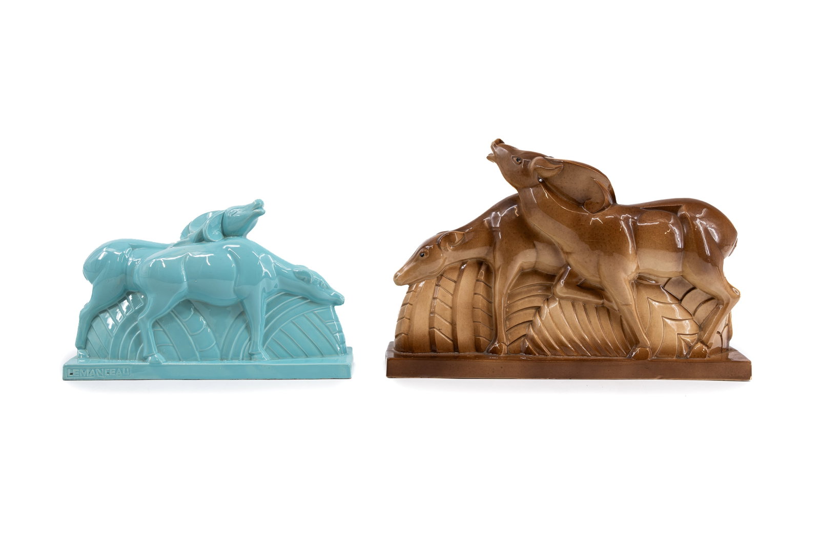 A composed lot of two Art Deco figural animalier groups by Charles Lemanceau: A composed lot of two Art Deco animalier groups by Charles Lemanceau, each depicting a pair of standing antelopes. Marked, first half of the 20th century. H: 22 - W: 36 cm. H: 30 - W: 46 cm.