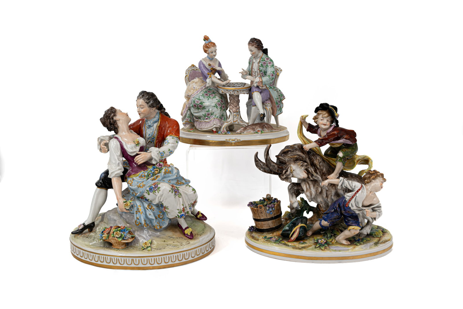 A lot of three German Saxony Rococo-style decorated porcelain figural groups (1 of 19)