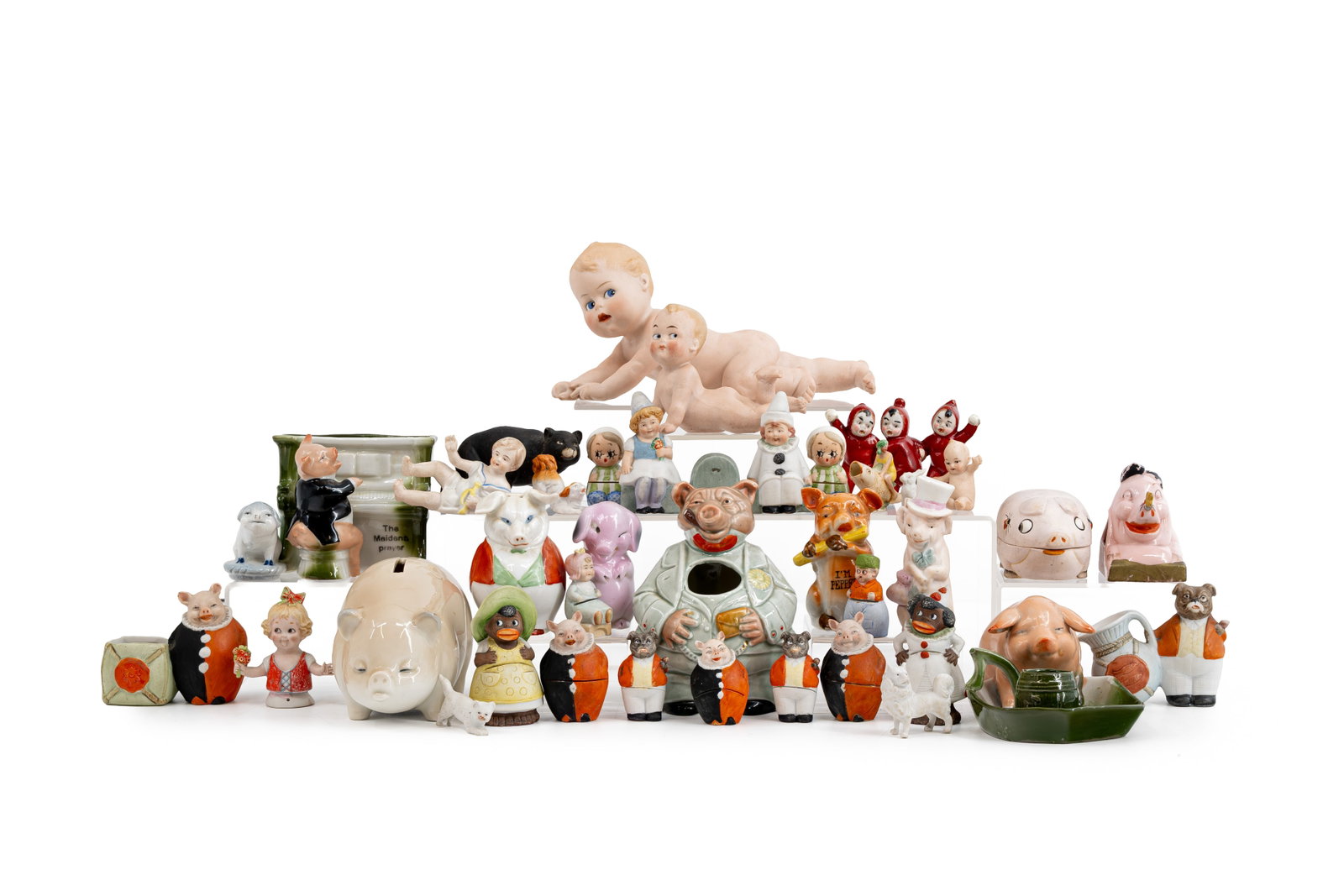 A large composed collection of antique variously shaped biscuit figurines (1 of 19)