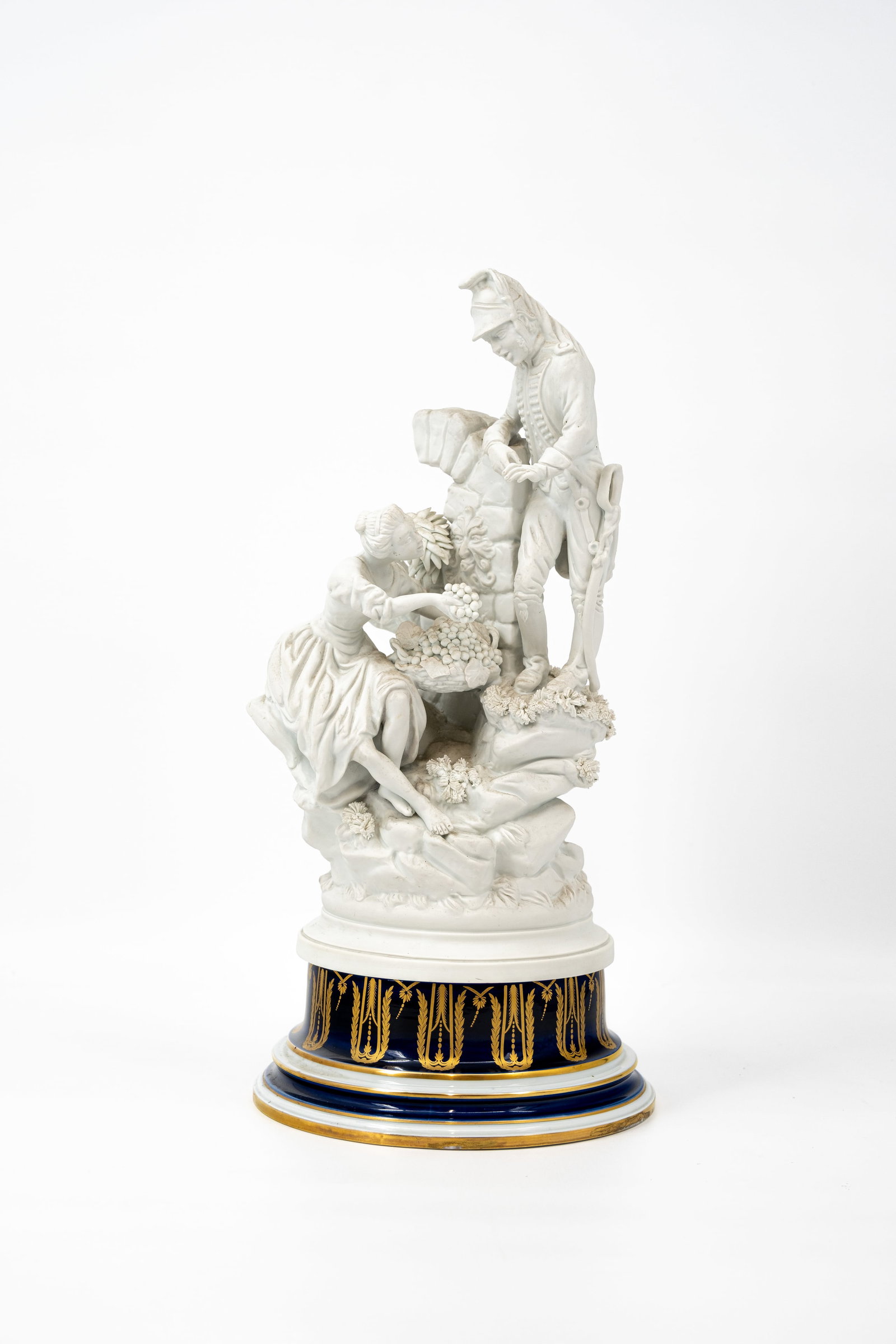 A 20th century French Sèvres style figurative white biscuit group, on a cobalt blue porcelain base (1 of 8)