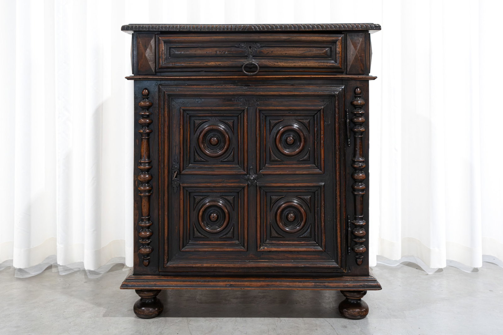 An antique and small baroque style decorated one door oak cabinet (1 of 5)