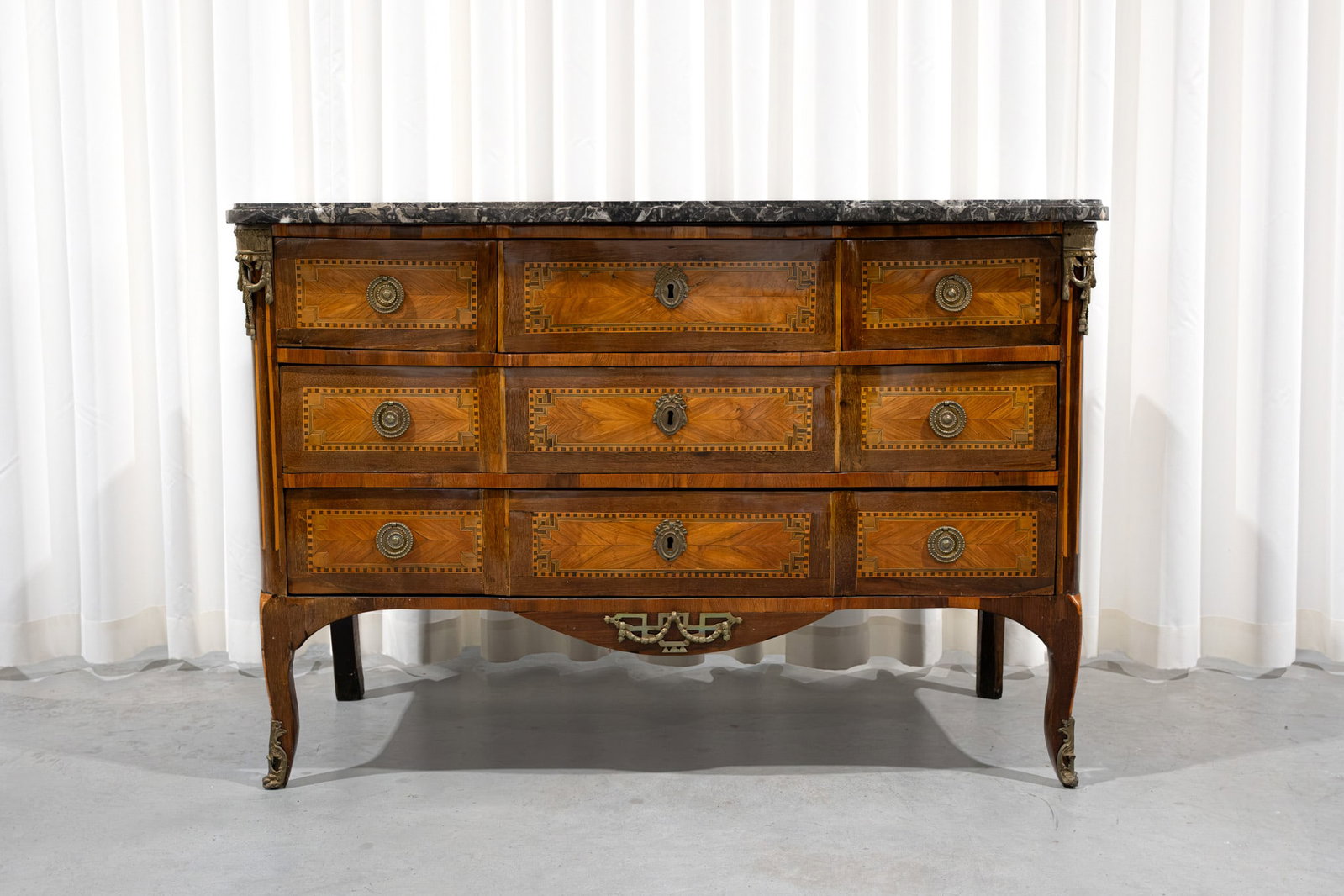 An antique French brass mounted Louis XVI marquetry commode (1 of 7)