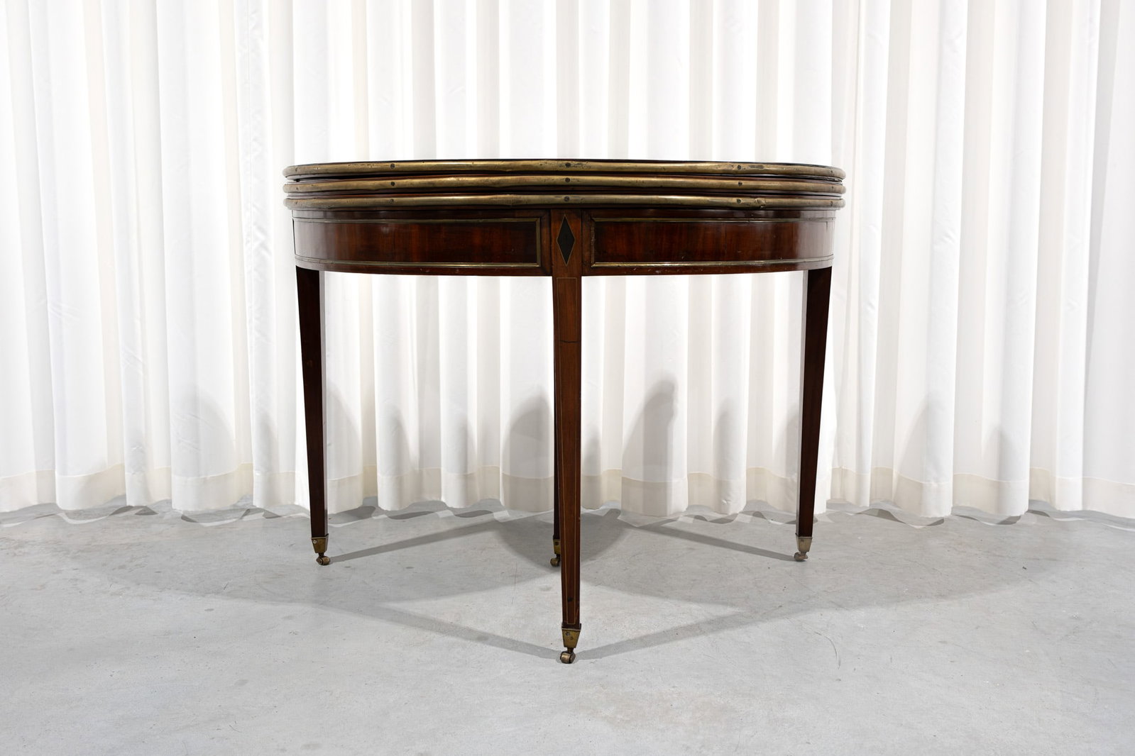 An antique French Louis XVI style mahogany folding console card table (1 of 10)