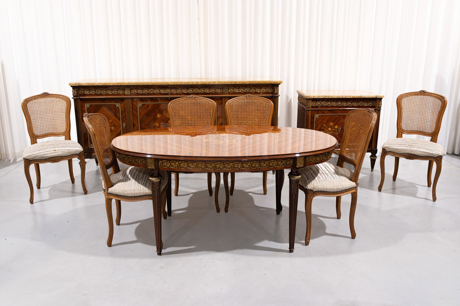 A 20th century Louis XVI-style marquetry mahogany and bronze mounted dining room set (1 of 20)