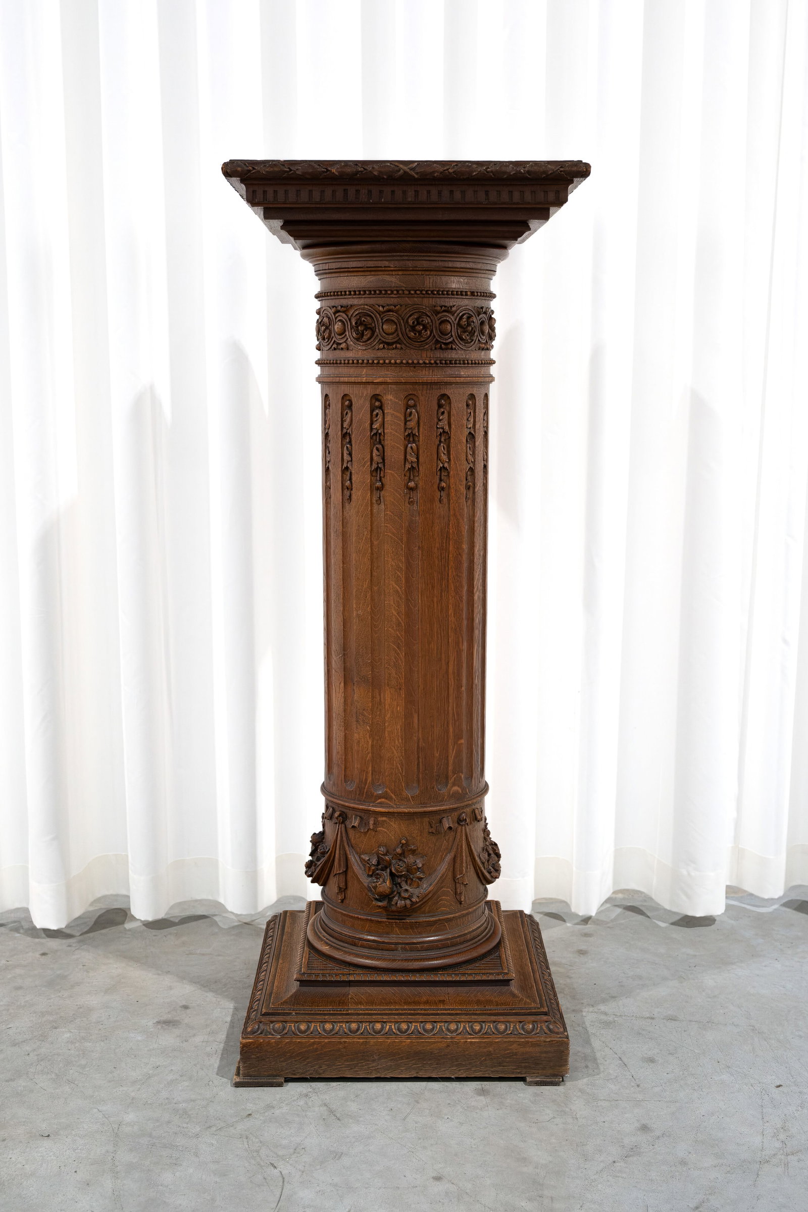 A large antique Neoclassical-style carved oak pedestal (1 of 7)