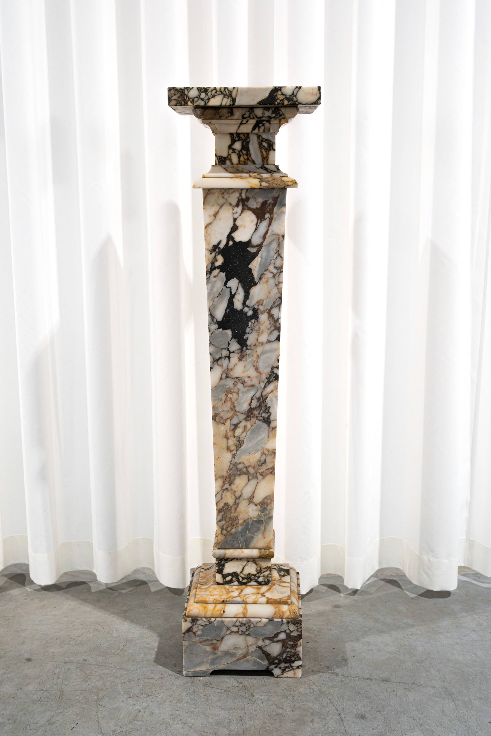 A large antique square-shaped Calacatta marble pedestal with a rotating top (1 of 5)