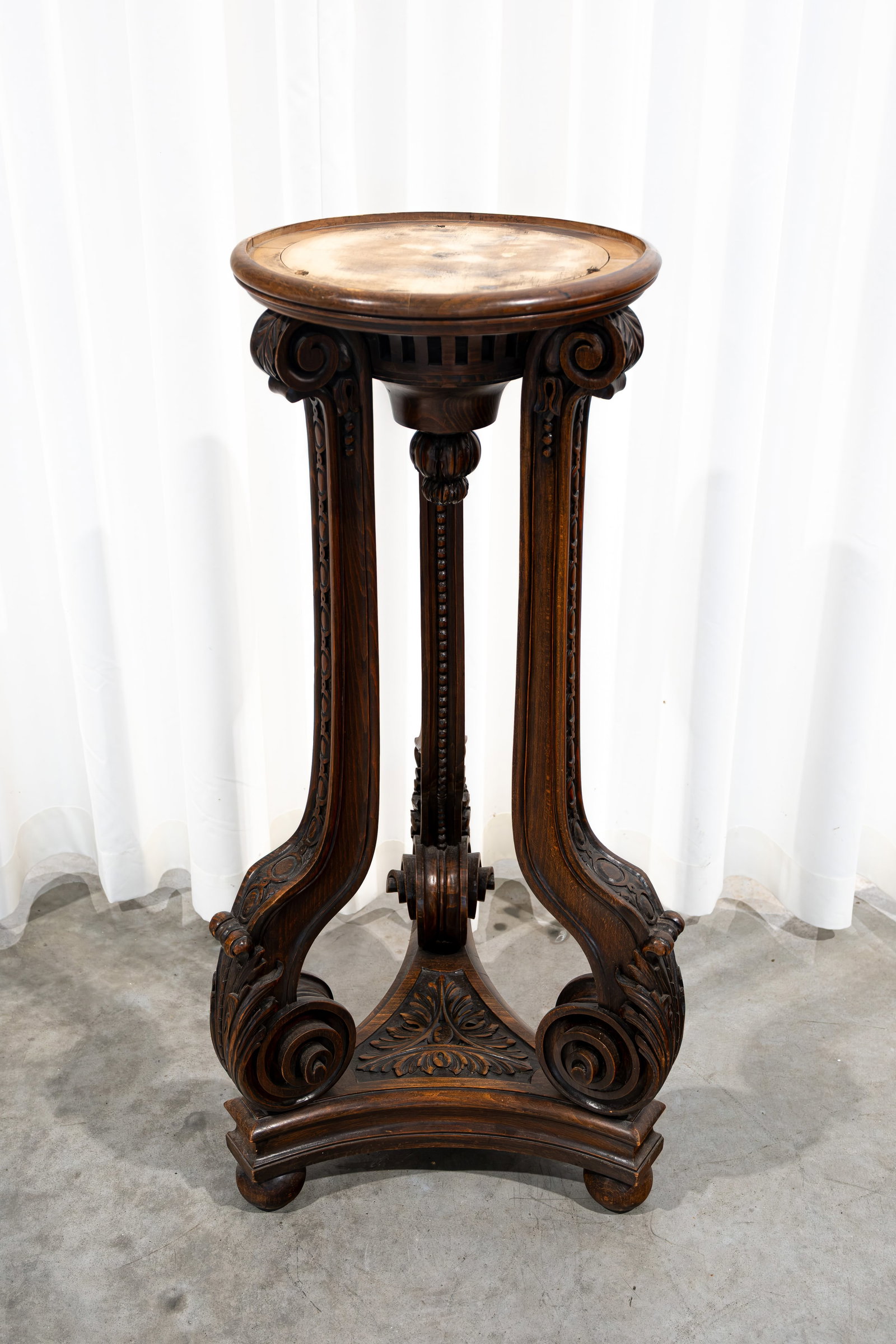 An antique neoclassical style carved wooded tripod pedestal (1 of 6)