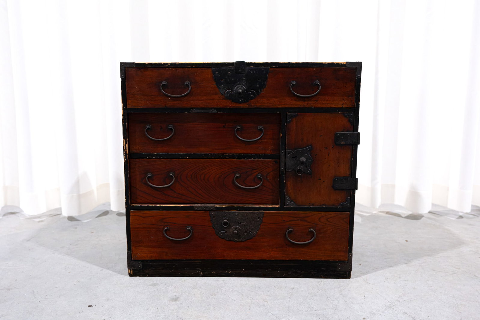 A small Japanese Tansu wooden chest of drawers with iron mountings (1 of 7)