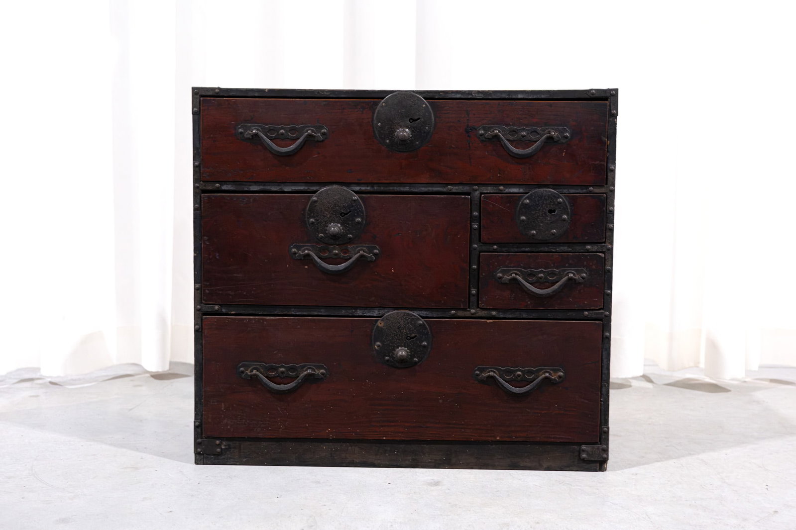A small Japanese Tansu wooden chest of drawers (1 of 7)