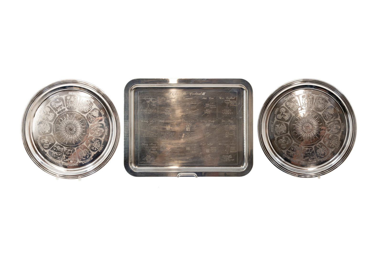 A lot of three French Christofle silver plated decorated trays engraved with cocktail recipes and (1 of 15)