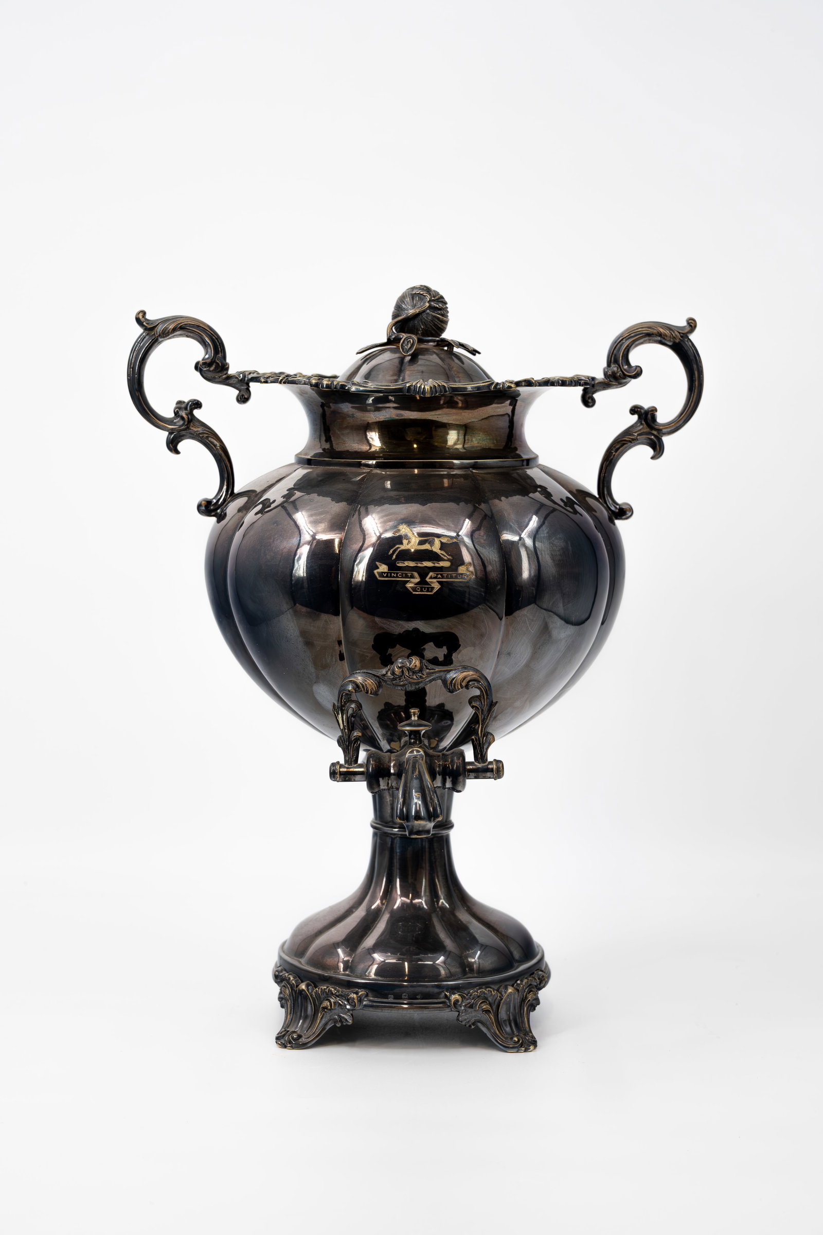 An antique silver-plated samovar decorated with scrolling handles (1 of 11)