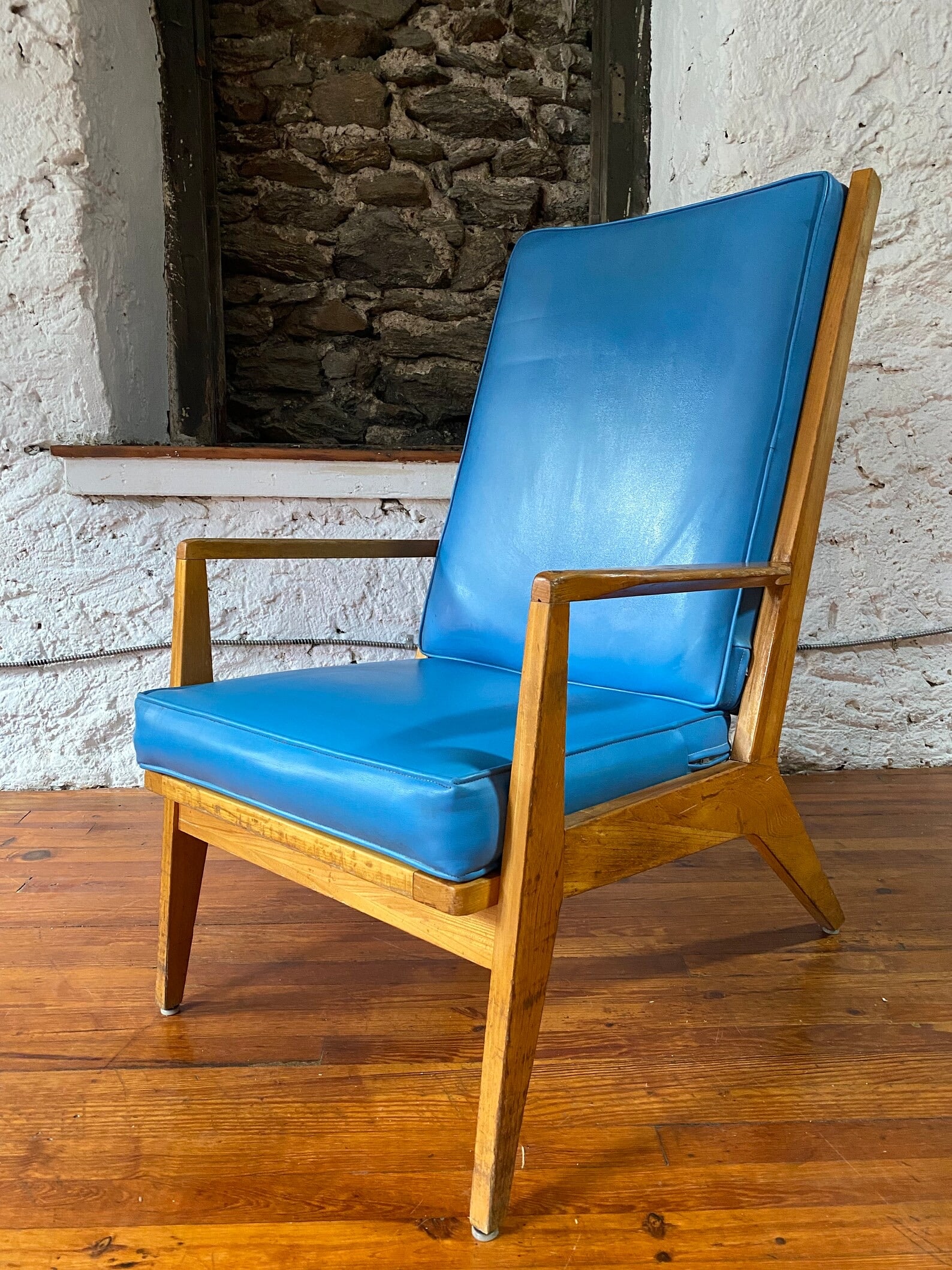 Mid Century Sculpted Maple Lounge Chair, Teal Vinyl Upholstery: Striking mid-century modern lounge chair featuring a sculpted solid maple frame paired with vibrant teal vinyl upholstery. Strong organic form with expressive woodworking and bold color contrast typic