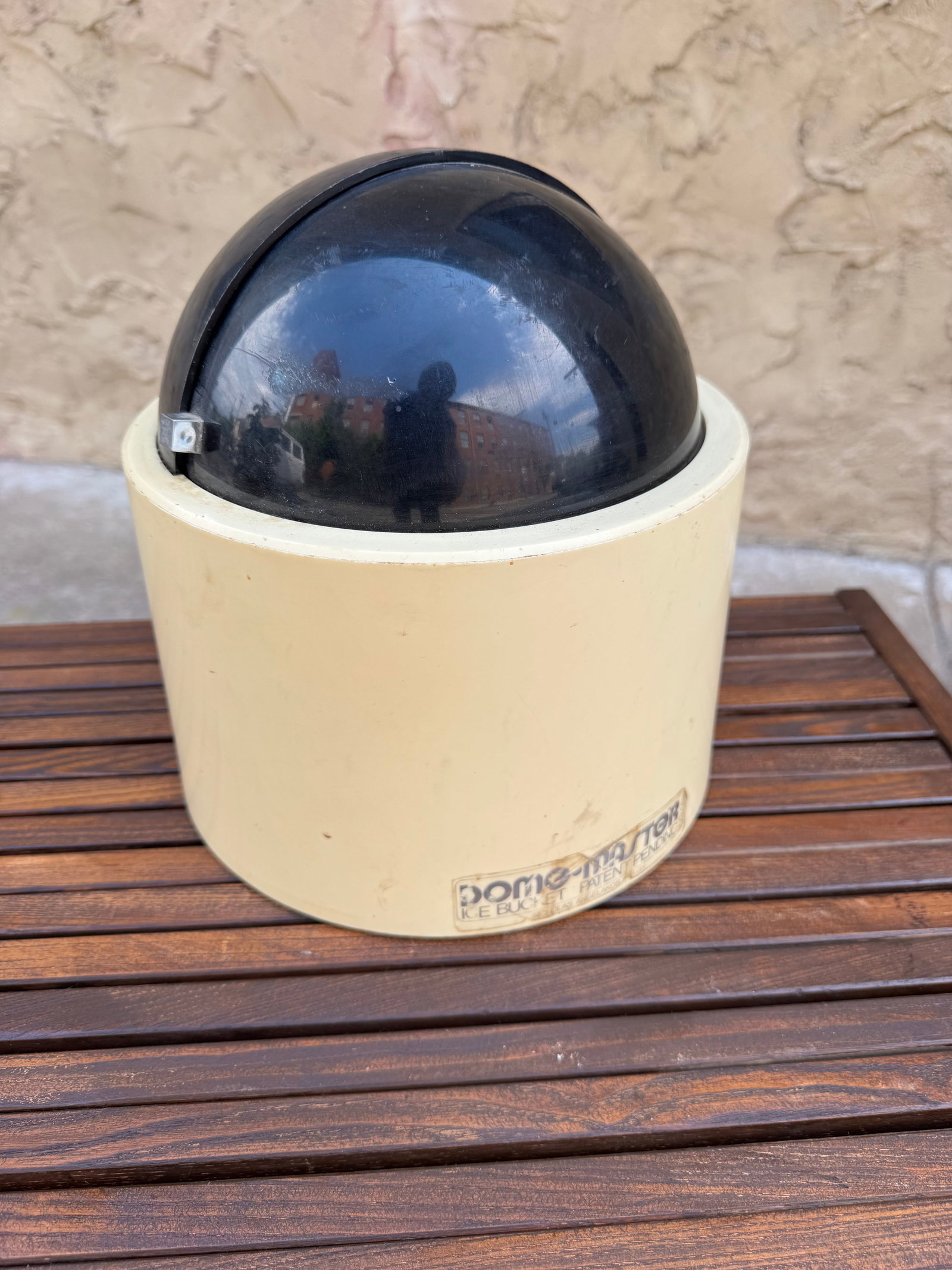 Vintage Colony Dome-Master Ice Bucket, Mid Century Barware: Vintage Colony Dome-Master ice bucket designed by Nicholas Angelakos for Lancaster Colony Corporation, featuring a cream cylindrical body with a distinctive black rotating dome lid. The sliding dome o