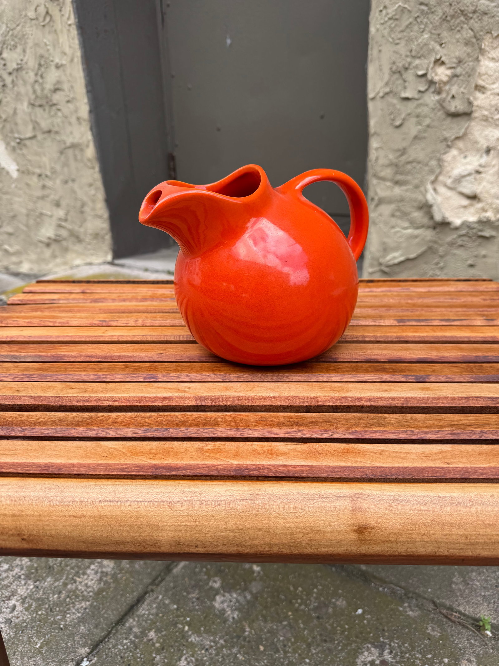 Vintage Homer Laughlin Harlequin Ball Jug Pitcher, Rare Red/Orange Uranium Glaze: Rare vintage Homer Laughlin Harlequin ball jug pitcher in the original “Red” glaze, displaying a vivid mandarin orange tone with classic Art Deco styling from the late 1930s–early 1940s. Fea