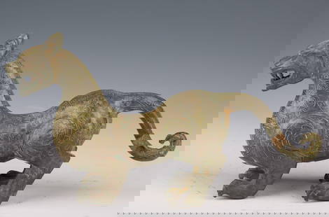 Chinese Bronze Tiger of the Han Dynasty: Bronze Tiger of the Han Dynasty in China" Introduction:
Step into the ancient world of China's Han Dynasty with the captivating Bronze Tiger sculpture, a remarkable artifact that