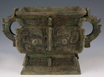 Chinese Bronze Ding of the Western Zhou Dynasty: Bronze Ding of the Western Zhou Dynasty in China" Introduction:
Transport yourself back in time to the ancient Western Zhou Dynasty of China with the exquisite Bronze Ding, a magnificent