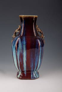 19th Century Chinese Flambe Glazed Vase with Twin Lizard Handles: "Exquisite 19th Century Chinese Flambe Glazed Vase with Twin Lizard Handles" Introduction:
Embark on a journey through time with this magnificent 19th-century Chinese Flambe Glazed Vase,
