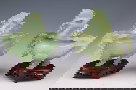 Pair of Early 20th Century Chinese Jade Censers: Pair of Early 20th Century Chinese Jade Censers Description:
Step into the opulent world of Chinese artistry with this remarkable pair of jade censers, dating back to the early 20th